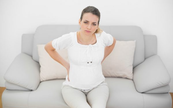 Болит поясница беременна